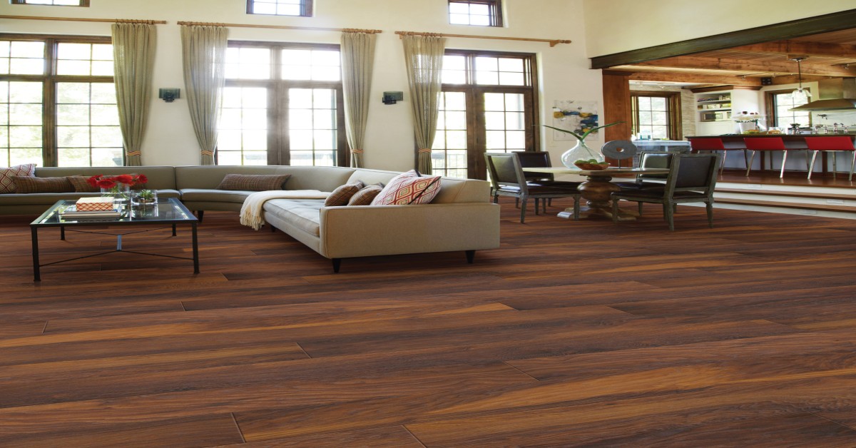 Cinnamon hickory laminate flooring with wide-plank design for durable laminate flooring installation.